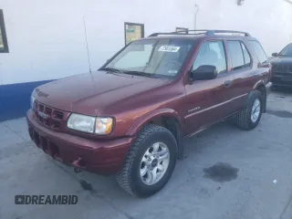 2002 Isuzu Rodeo S with VIN 4S2DM58W824313096, listed as a Copart auction lot 77951364 with 127,470 mi miles and Salvage Title. Bid and sale history available at DreamBid. Image 1.