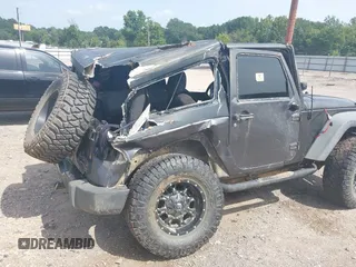 2014 Jeep Wrangler Sport with VIN 1C4AJWAGXEL233647, listed as a IAAI auction lot 39993785 with Not Provided miles and . Bid and sale history available at DreamBid. Image 21.