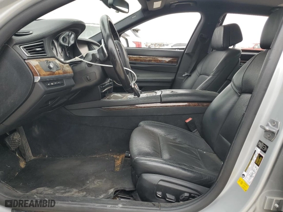 2013 BMW 7 Series 750Li with VIN WBAYE8C56DD133044, listed as a Copart auction lot 49092615 with 169,699 mi miles and Salvage Title. Bid and sale history available at carsss.com. Image 7.