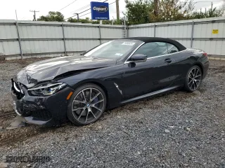 2019 BMW 8 Series M850i xDrive with VIN WBAFY4C58KBX39395, listed as a Copart auction lot 74088834 with 27,413 mi miles and Salvage Title. Bid and sale history available at carsss.com. Image 1.