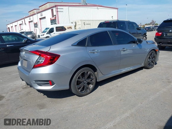 2019 Honda Civic Sedan Sport with VIN 2HGFC2F85KH515599, listed as a IAAI auction lot 41885201 with 76,653 mi miles. Bid and sale history available at carsss.com. Image 4.