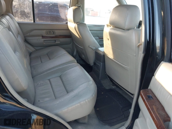 1998 Infiniti QX4 with VIN JNRAR05Y2WW028333, listed as a IAAI auction lot 41759775 with 216,473 mi miles and . Bid and sale history available at DreamBid. Image 8.