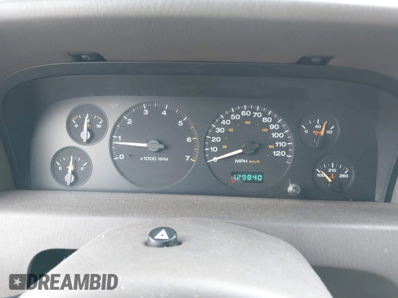 1999 Jeep Grand Cherokee Limited with VIN 1J4GW68N7XC739479, listed as a IAAI auction lot 41448323 with 129,840 mi miles. Bid and sale history available at carsss.com. Image 7.