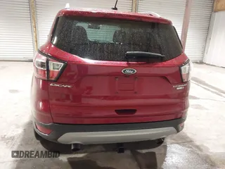 2017 Ford Escape Titanium z VIN 1FMCU9J9XHUC20359, wystawiony jako IAAI lot #41938688 z przebiegiem 79 743 mil mil oraz . Historia ofert i sprzedaży dostępna na DreamBid. Obrazek 16.