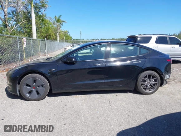 2023 Tesla Model 3 with VIN 5YJ3E1EAXPF623403, listed as a IAAI auction lot 41829543 with 29,414 mi miles and . Bid and sale history available at carsss.com. Image 15.