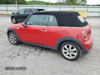 2010 MINI Convertible S with VIN WMWMS3C50ATY08821, listed as a Copart auction lot 53547595 with 54,438 mi miles and Salvage title. Bid and sale history available at DreamBid. Image 2.