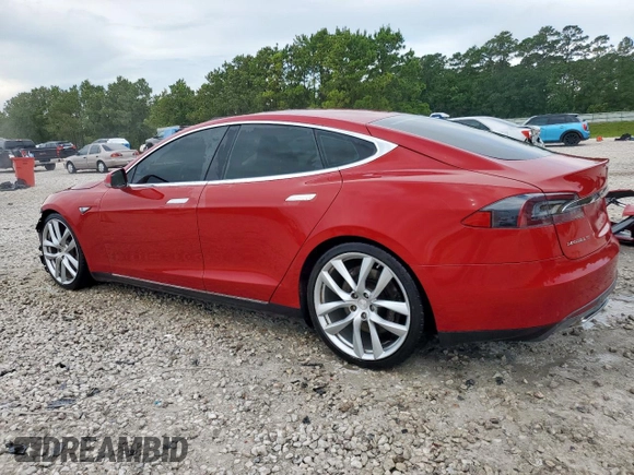 2014 Tesla Model S 60 with VIN 5YJSA1H11EFP43669, listed as a Copart auction lot 62368605 with Not provided miles and Salvage title. Bid and sale history available at DreamBid. Image 2.