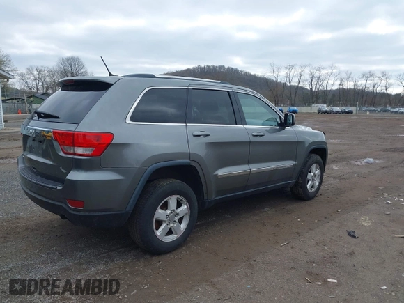 2012 Jeep Grand Cherokee Laredo with VIN 1C4RJFAG0CC270545, listed as a IAAI auction lot 41940781 with 200,529 mi miles. Bid and sale history available at carsss.com. Image 4.