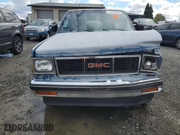 1990 GMC Sonoma z VIN 1GTCS19Z4L8502532, wystawiony jako Copart lot #71074514 z przebiegiem 148 195 mil mil oraz Szkody całkowita. Historia ofert i sprzedaży dostępna na DreamBid. Obrazek 5.