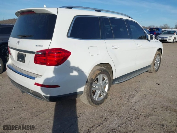 2015 Mercedes-Benz GL-Class GL 450 with VIN 4JGDF6EEXFA616584, listed as a IAAI auction lot 41084479 with 144,472 mi miles. Bid and sale history available at carsss.com. Image 4.