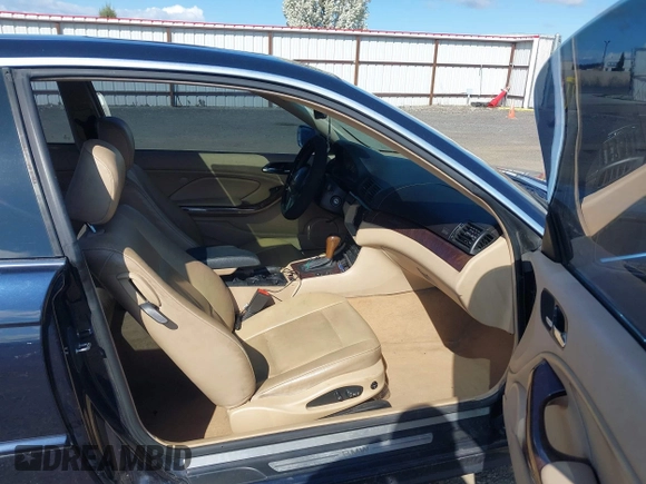 2006 BMW 3 Series 325Ci with VIN WBABD33446PL08864, listed as a IAAI auction lot 42078036 with 146,880 mi miles. Bid and sale history available at carsss.com. Image 5.