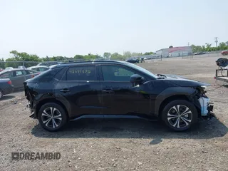 2024 Toyota bZ4X XLE with VIN JTMABACA7RA061457, listed as a IAAI auction lot 42395872 with 16,558 mi miles and . Bid and sale history available at DreamBid. Image 14.
