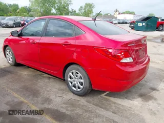 2014 Hyundai Accent GLS with VIN KMHCT4AEXEU600395, listed as a IAAI auction lot 42141052 with 172,284 mi miles. Bid and sale history available at carsss.com. Image 3.