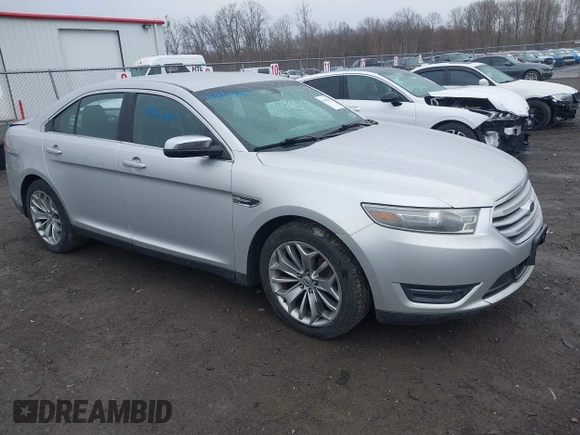 2014 Ford Taurus Limited with VIN 1FAHP2F81EG123933, listed as a IAAI auction lot 41843301 with 111,629 mi miles. Bid and sale history available at carsss.com. Image 1.
