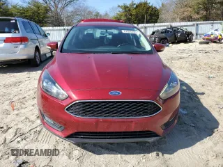 2017 Ford Focus SEL with VIN 1FADP3H29HL221679, listed as a Copart auction lot 47004285 with 73,779 mi miles and Salvage Title. Bid and sale history available at carsss.com. Image 5.