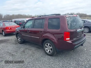 2010 Honda Pilot Touring with VIN 5FNYF4H95AB040721, listed as a IAAI auction lot 41928412 with 213,219 mi miles and . Bid and sale history available at carsss.com. Image 3.