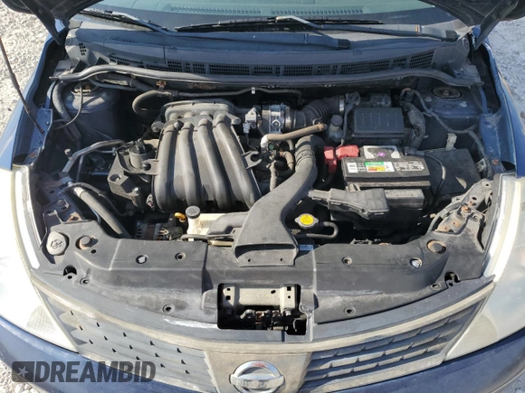 2009 Nissan Versa 1.6 z VIN 3N1CC11E49L499117, wystawiony jako Copart lot #56486285 z przebiegiem 129 114 mil mil oraz Szkoda całkowita • Salvage title. Historia ofert i sprzedaży dostępna na DreamBid. Obrazek 11.