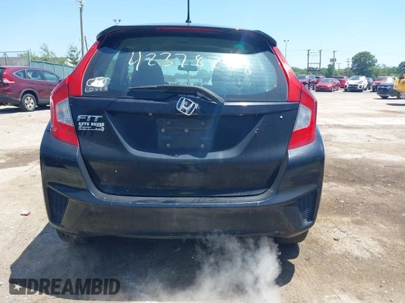 2015 Honda Fit LX z VIN 3HGGK5H56FM712266, wystawiony jako IAAI lot #42378228 z przebiegiem 140 423 mil mil oraz . Historia ofert i sprzedaży dostępna na DreamBid. Obrazek 16.
