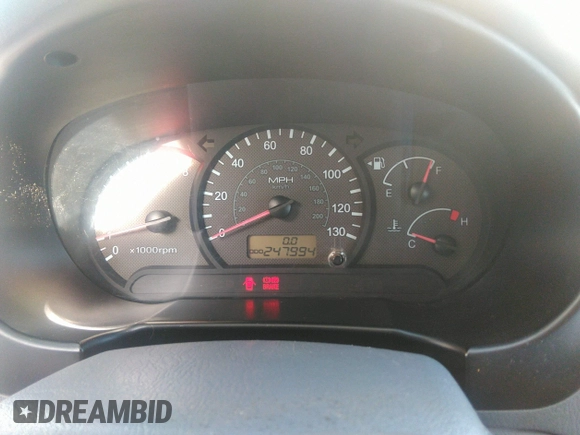2004 Hyundai Accent GL with VIN KMHCG45C04U498939, listed as a IAAI auction lot 41384821 with 247,994 mi miles. Bid and sale history available at carsss.com. Image 7.