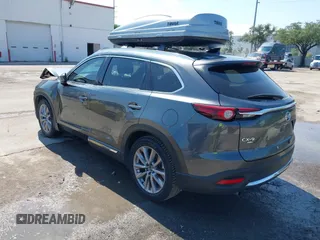 2022 Mazda CX-9 Grand Touring with VIN JM3TCBDY4N0618680, listed as a IAAI auction lot 40086806 with 34,142 mi miles and . Bid and sale history available at DreamBid. Image 3.