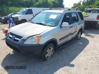 2002 Honda CR-V EX with VIN JHLRD78822C046562, listed as a IAAI auction lot 42752103 with 312,890 mi miles and . Bid and sale history available at DreamBid. Image 2.