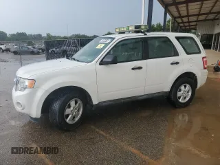 2011 Ford Escape XLS with VIN 1FMCU0C74BKC27897, listed as a Copart auction lot 63084415 with 116,423 mi miles and Clean title. Bid and sale history available at DreamBid. Image 1.