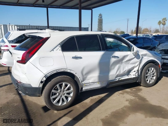 2020 Cadillac XT4 FWD Luxury with VIN 1GYAZAR45LF039362, listed as a IAAI auction lot 41445409 with 76,869 mi miles. Bid and sale history available at carsss.com. Image 14.
