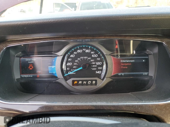 2014 Ford Taurus Limited with VIN 1FAHP2F81EG183128, listed as a Copart auction lot 82409384 with 107,624 mi miles and Salvage title. Bid and sale history available at DreamBid. Image 9.