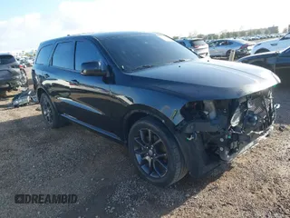 2015 Dodge Durango R/T with VIN 1C4SDHCT5FC937872, listed as a IAAI auction lot 41796682 with 109,595 mi miles and . Bid and sale history available at carsss.com. Image 1.