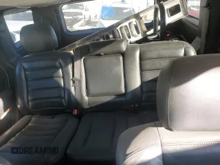2005 Hummer H2 SUV with VIN 5GRGN23U25H115698, listed as a Copart auction lot 82569874 with 143,367 mi miles and Salvage Title. Bid and sale history available at carsss.com. Image 10.