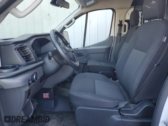 2021 Ford Transit Cargo with VIN 1FTBR1Y83MKA70780, listed as a Copart auction lot 77207664 with Not provided miles and Clean title. Bid and sale history available at DreamBid. Image 7.