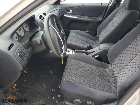 2003 Mazda Protege DX with VIN JM1BJ226631162054, listed as a Copart auction lot 70961034 with 85,794 mi miles and Salvage Title. Bid and sale history available at carsss.com. Image 7.