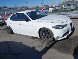 2020 Alfa Romeo Giulia with VIN ZARFAMAN6L7631460, listed as a IAAI auction lot 41383136 with 46,877 mi miles. Bid and sale history available at carsss.com. Image 1.
