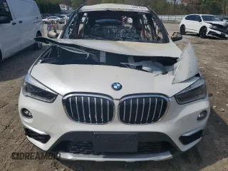 2019 BMW X1 xDrive28i with VIN WBXHT3C55K5L89892, listed as a Copart auction lot 55467665 with Not provided miles and Salvage title. Bid and sale history available at DreamBid. Image 5.