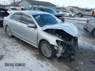 2016 Volkswagen Passat 1.8T SE with VIN 1VWBT7A34GC017777, listed as a IAAI auction lot 41541838 with 106,673 mi miles. Bid and sale history available at carsss.com. Image 1.