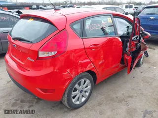 2012 Ford Fiesta SE with VIN 3FADP4EJ5CM170268, listed as a IAAI auction lot 42023185 with 106,659 mi miles. Bid and sale history available at carsss.com. Image 4.