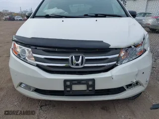 2013 Honda Odyssey Touring with VIN 5FNRL5H96DB089336, listed as a IAAI auction lot 41527990 with 128,770 mi miles. Bid and sale history available at carsss.com. Image 6.