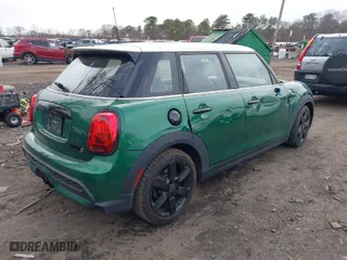 2022 MINI Hardtop 4 Door Cooper S with VIN WMW53DK07N2S44464, listed as a IAAI auction lot 41635613 with 28,303 mi miles. Bid and sale history available at carsss.com. Image 4.