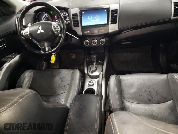 2010 Mitsubishi Outlander XLS z VIN JA4JT4AX9AZ002688, wystawiony jako Copart lot #51173605 z przebiegiem 162 147 mil mil oraz Szkoda całkowita • Salvage title. Historia ofert i sprzedaży dostępna na DreamBid. Obrazek 8.