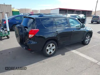 2008 Toyota RAV4 with VIN JTMBD33V986063323, listed as a IAAI auction lot 42025044 with 163,785 mi miles. Bid and sale history available at carsss.com. Image 4.