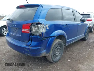 2015 Dodge Journey SE z VIN 3C4PDCAB8FT552555, wystawiony jako IAAI lot #42195398 z przebiegiem 149 503 mil mil oraz . Historia ofert i sprzedaży dostępna na DreamBid. Obrazek 4.