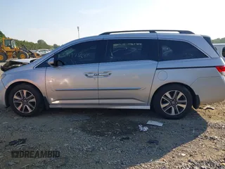 2014 Honda Odyssey Touring with VIN 5FNRL5H95EB108427, listed as a IAAI auction lot 39992643 with 100,658 mi miles and . Bid and sale history available at DreamBid. Image 14.