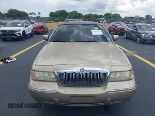 1999 Mercury Grand Marquis LS z VIN 2MEFM75W7XX665959, wystawiony jako IAAI lot #42187818 z przebiegiem 123 126 mil mil oraz . Historia ofert i sprzedaży dostępna na DreamBid. Obrazek 12.