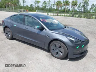 2023 Tesla Model 3 with VIN 5YJ3E1EA4PF461624, listed as a IAAI auction lot 42433789 with 22,182 mi miles and . Bid and sale history available at DreamBid. Image 1.