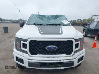 2020 Ford F-150 XL z VIN 1FTEW1EP6LFB78478, wystawiony jako IAAI lot #42370442 z przebiegiem 74 875 mil mil oraz . Historia ofert i sprzedaży dostępna na DreamBid. Obrazek 13.
