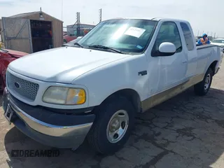 1999 Ford F-150 with VIN 1FTZX1720XKB31945, listed as a IAAI auction lot 42123984 with 187,766 mi miles and . Bid and sale history available at DreamBid. Image 19.