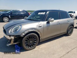 2017 MINI Hardtop 4 Door Cooper with VIN WMWXU1C53H2E18438, listed as a Copart auction lot 52871475 with 133,235 mi miles and Salvage Title. Bid and sale history available at DreamBid. Image 1.