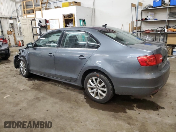 2013 Volkswagen Jetta SE with VIN 3VWDX7AJ2DM309725, listed as a Copart auction lot 86052114 with 70,828 mi miles and Salvage title. Bid and sale history available at DreamBid. Image 2.