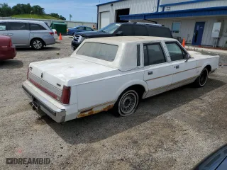 1989 Lincoln Town Car with VIN 1LNBM81F1KY658361, listed as a Copart auction lot 58558244 with 85,349 mi miles and Non Repairable. Bid and sale history available at carsss.com. Image 3.