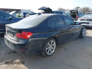 2015 BMW 3 Series 328i with VIN WBA3A5C55FF607013, listed as a IAAI auction lot 41527827 with 80,000 mi miles. Bid and sale history available at carsss.com. Image 4.